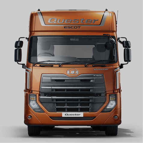 រថយន្តដឹកទំនិញពណ៌ទឹកក្រូចប្រាក់នៅមុខផ្ទាល់