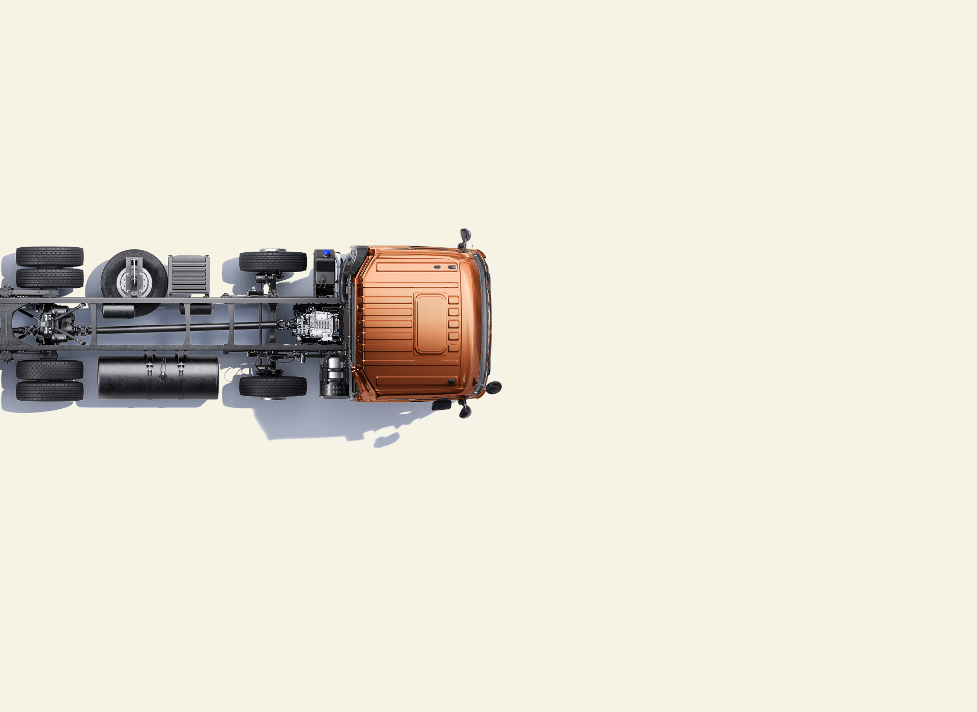 Trak pikap oren dilihat dari atas di atas latar belakang krim.