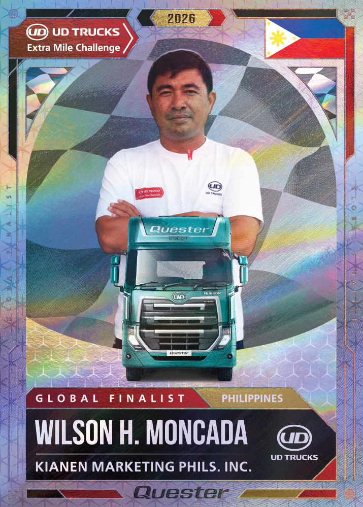 Man in a white shirt posing behind a green truck, competition finalist card design.