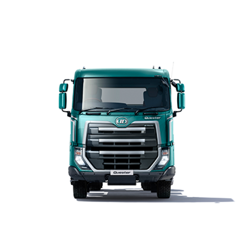 Truk besar warna hijau tua tampak dari depan dengan latar belakang putih.