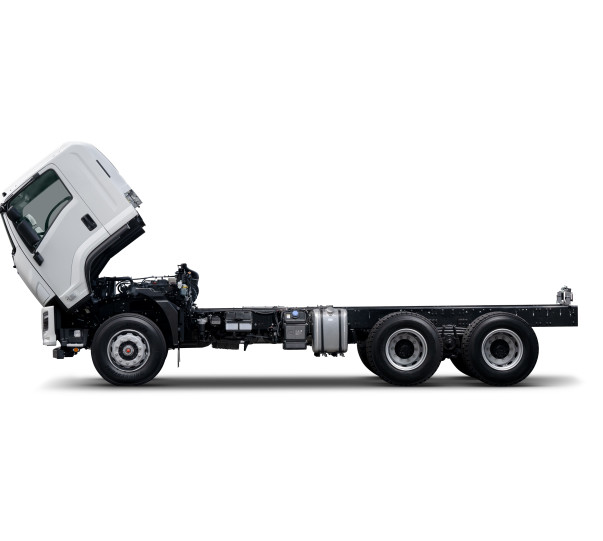 White truck chassis with tilted cab on a white background.